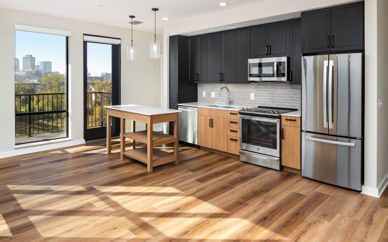 Natural light streams in the open concept kitchen floor plan