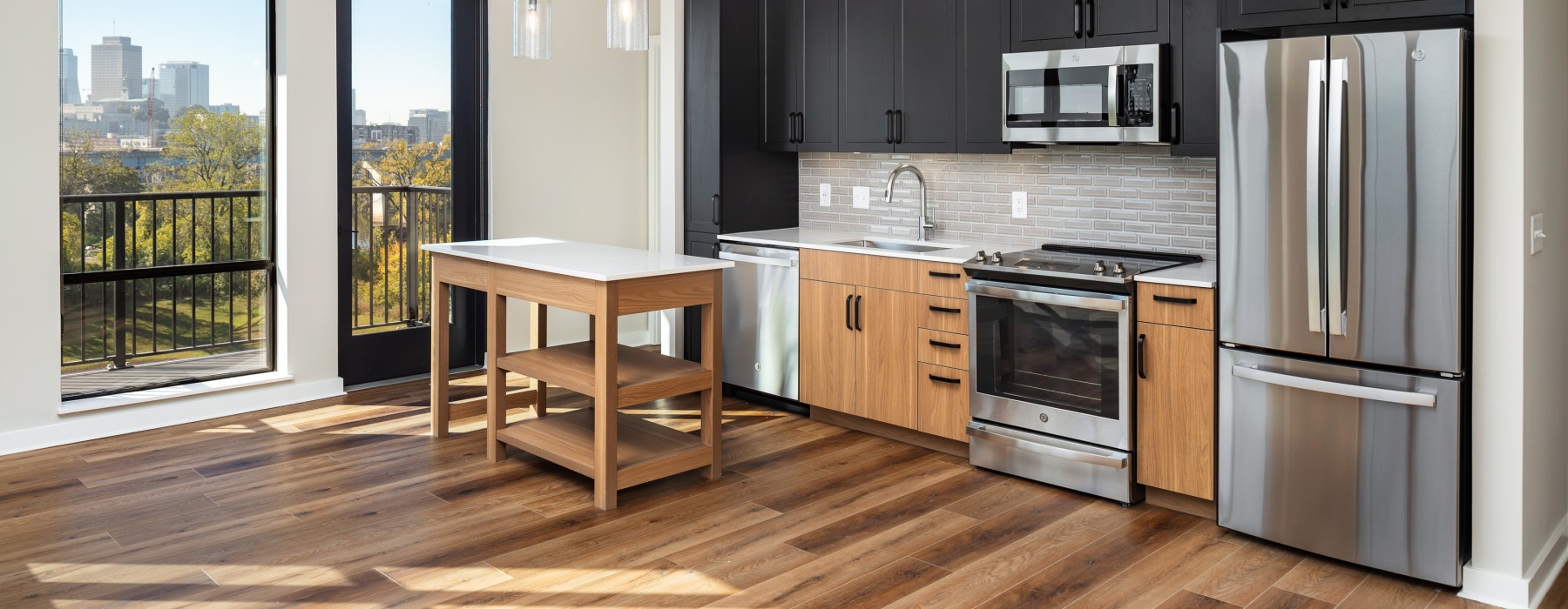 Natural light streams in the open concept kitchen floor plan