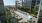 a pool in a courtyard between buildings